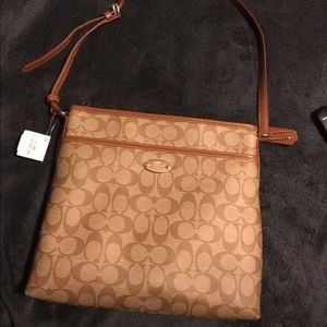 Authentic coach tan messenger bag